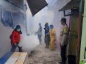 Babinkamtibmas Perak Timur Bersama Instansi Samping Lakukan Fogging di Kampung-Kampung