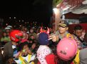 Kapolres Tanjung Perak Bersama Masyarakat Lepas Ribuan Balon Merah-Putih