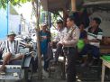 Babinkamtibmas Krembangan Utara Sambang Warga Pesapen Kali, Sampaikan Himbauan Anti Hoax