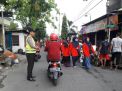 Babinkamtibmas Sidotopo Wetan Kawal Jalan Sehat HUT TP Wachid Hasyim
