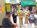 Babinkamtibmas Perak Timur Sosialisasikan Protokol Kesehatan Ke Warga Tambak Gringsing