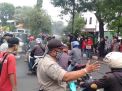 Polsek Semampir Bersama LSM Lakukan Penyemprotan Disiinfektan di Jalan Sultan Iskandar Muda