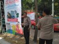 Polsek Kenjeran Sosialisasi & Pasang Banner Nobar Final Piala Dunia
