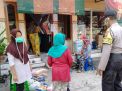 Babinkamtibmas Polsek Pabean Cantikan Amankan Pengambilan Paket Sembako
