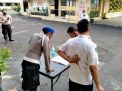 Cegah Penyebaran Covid-19, Urkes Polres Tanjung Perak Lakukan Cek Suhu Badan