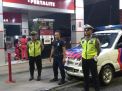Polsek Asemrowo Gelar Patroli Malam di SPBU Sampaikan Waspada Uang Palsu