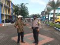 Babinkamtibmas Krembangan Utara Amankan Pengambilan BLT di SMK Barunawati