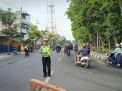 Bantu Pekerja & Anak Sekolah, Satlantas Polres Tanjung Perak Atur Lalu Lintas Pagi