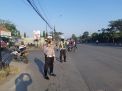 Satlantas Polres Tanjung Perak Laksanakan Pengaturan Pagi Bantu Keberangkatan Pekerja