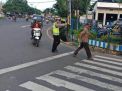 Polsek Krembangan Laksanakan Pengaturan Sore Bantu Kepulangan Pekerja