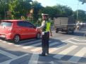 Berikan Pelayanan Kepada Masyarakat, Unit Lantas Polsek Kenjeran Lakukan Pengaturan Pagi