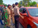 Polsek Asemrowo Gelar Operasi Penyekatan Bersama Instansi Samping di Pospam Jalan Dupak Rukun