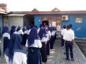 Babinkamtibmas Perak Timur Kawal UNBK di SMP Gatra