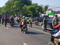 Kapolsek Pabean Cantikan Bersama Danramil Pimpin Operasi Penertiban Masker di Jalan Rajawali