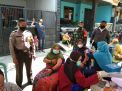 POLSEK KENJERAN LAKUKAN PENGAMANAN VAKSINASI DI JL. TANAH MERAH