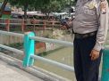 Polsek Pabean Cantikan Cek Ketinggian Debit Air di Sungai Kalimas, Waspada Adanya Potensi Banjir