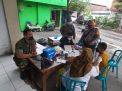 Bhabinkamtibmas Perak Utara Laksanakan Pengamanan Kegiatan Vaksinasi Untuk Masyarakat Umum, Pastikan Berjalan Aman dan Lancar