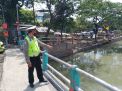 Polsek Pabean Cantikan Rutin Patroli Debit Air Sungai, Terpantau Masih Dalam Batas Normal