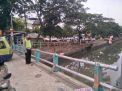 Polsek Pabean Cantikan Cek Ketinggian Air Sungai Kalimas, Terpantau Air Masih Dalam Batas Normal
