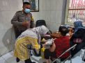 Polsek Pabean Cantikan Bantu Pengamanan Pelaksanaan Vaksinasi di Kelurahan Bongkaran, Pastikan Situasi Berjalan Aman dan Terkendali