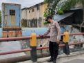 Polsek Krembangan Lakukan Pengcekan Debit Air Sungai di Jalan Solotigo, Terpantau Dalam Kondisi Aman
