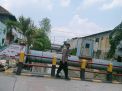 Waspada Adanya Potensi Bencana Banjir, Polsek Krembangan Rutin Cek Ketinggian Debit Pintu Air Sungai