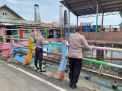 Anggota Polsek Kenjeran Cek Ketinggian Debit Air Sungai Kejawan Lor, Terpantau Tidak Ada Potensi Banjir