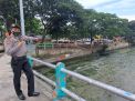 Polsek Pabean Cantikan Rutin Laksanakan Pengecekan Ketinggian Debit Air Sungai Kalimas, Waspada Potensi Banjir