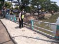 Polsek Pabean Cantikan Cek Ketinggian Debit Air Sungai Kalimas, Antisipasi Potensi Banjir