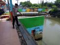 Polsek Asemrowo Laksanakan Pengecekan Ketinggian Debit Air Sungai, Antisipasi Adanya Potensi Banjir