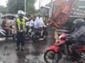 Polsek Asemrowo Laksanakan Pengaturan Lalu Lintas Sore di Tambak Mayor, Situasi Terpantau Aman Terkendali
