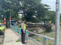 Polsek Pabean Cantikan Laksanakan Pemantauan Debit Air di Sungai Kalimas Antisipasi Potensi Banjir