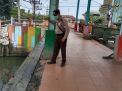 Polsek Asemrowo Laksanakan Patroli Pengecekan Pintu Air, Terpantau Dalam Ketinggian Aman
