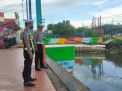 Polsek Asemrowo Cek Ketinggian Debit Pompa Air dan Sungai Antisipasi Potensi Banjir