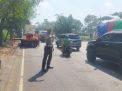 Personil Rowo 12.1 dan Piket Fungsi Tangguh dalam Giat Pengamanan dan Pengaturan Arus Lalu Lintas di Jalan Margomulyo