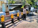 Polsek Krembangan Pantau Debit Air di Pintu Air Solotigo, Terpantau Dalam Batas Normal