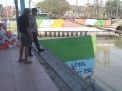 Polsek Asemrowo Antisipasi Adanya Potensi Banjir Melalui Pengecekan Debit Pompa Air
