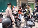 Polsek Semampir Berikan Himbauan Kepada Juru Parkir Wisata Religi Ampel