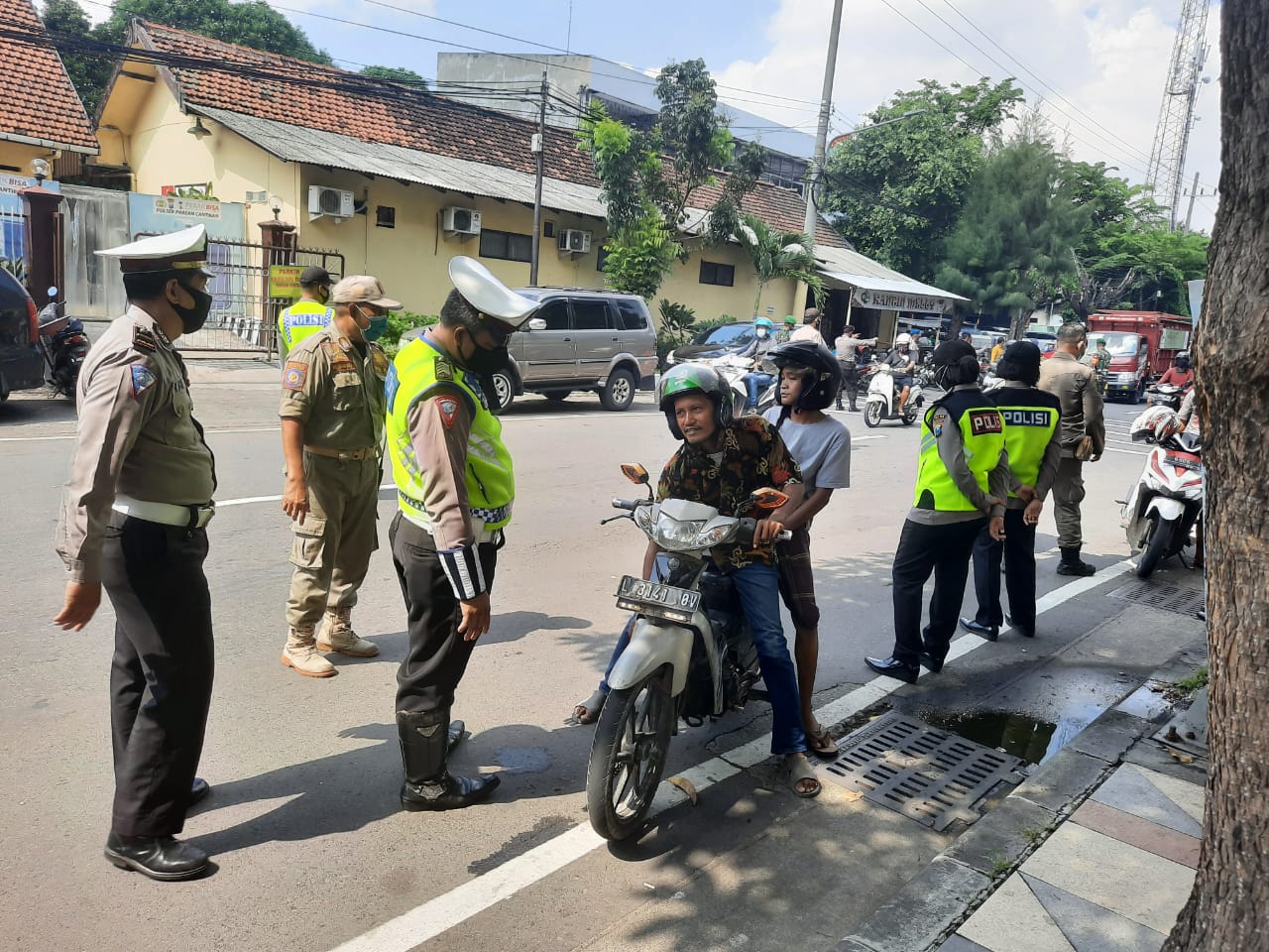 Polres Tanjung Perak Gelar Operasi Yustisi Protokol Kesehatan di Jalan Stasiun Kota