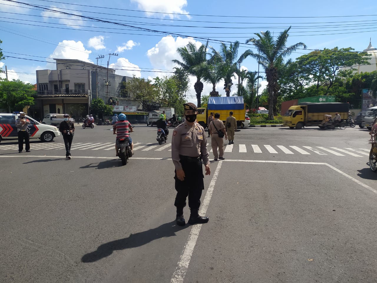 Polsek Semampir Lakukan Operasi Masker Bersama Personil Gabungan di Jalan KH Mas Mansyur
