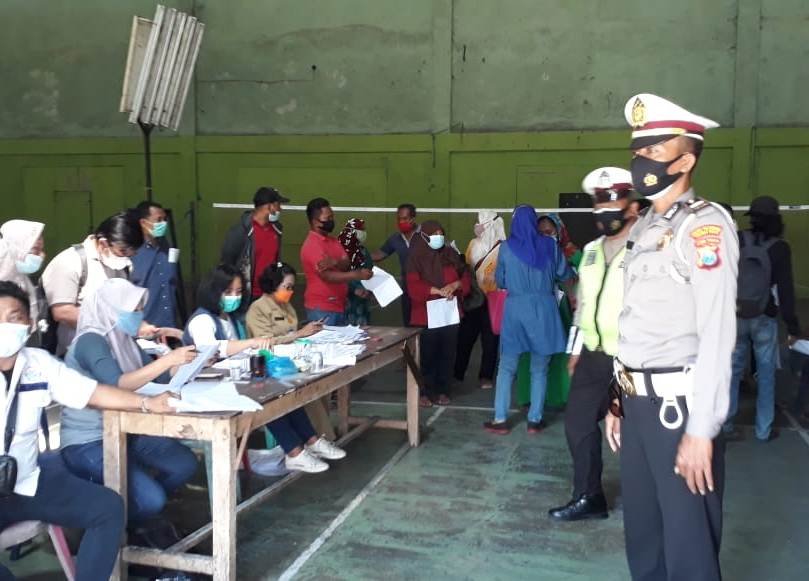 Polsek Asemrowo Kawal Pembagian Bantuan Sosial Tunai