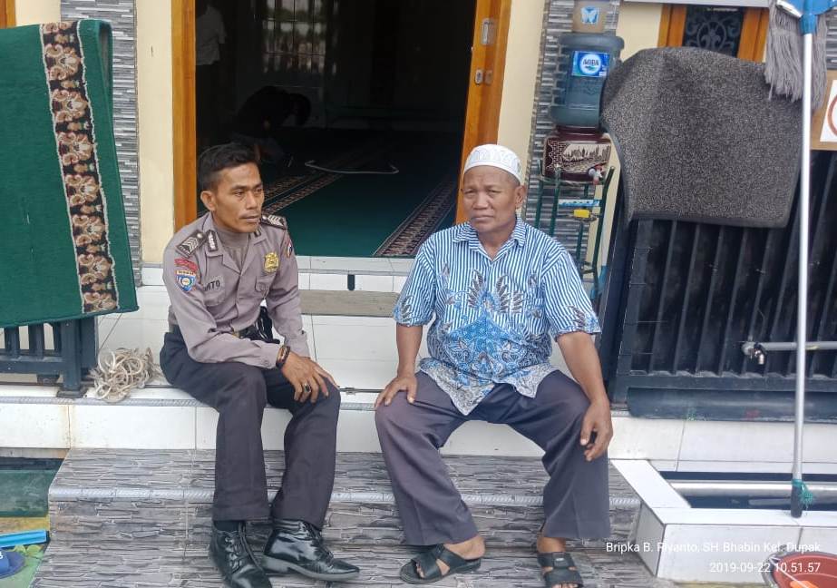 Babinkamtibmas Dupak Sambang Toga, Sampaikan Himbauan Kerukunan