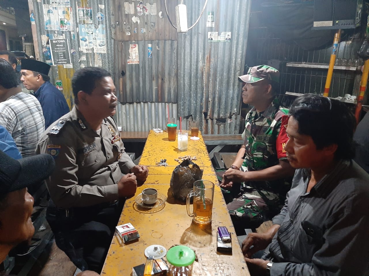 Babinkamtibmas Krembangan Utara Sosialisasi SPKT Door To Door Ke Warga Dapuan