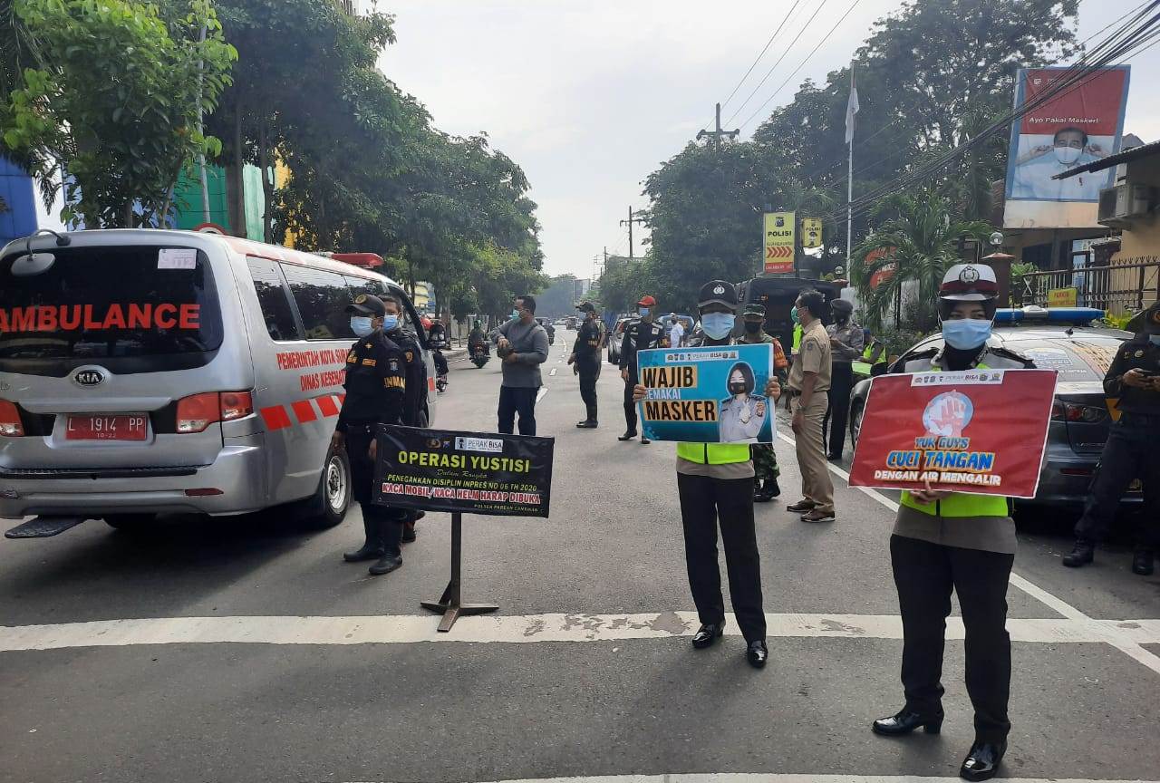 Kapolsek Pabean Cantikan Pimpin Operasi Yustisi Protokol Kesehatan Gabungan di Jalan Waspada