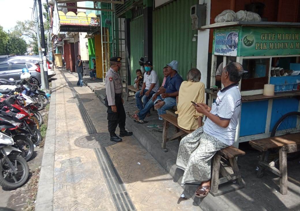 Polsek Semampir Sampaikan Himbauan Jaga Jarak, Cegah Penyebaran Virus Corona